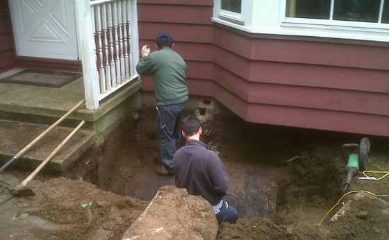 550 gallon removal from under a house