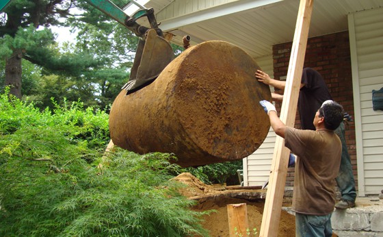 550 gallon guided out by Techs with Mini Excavator Operator